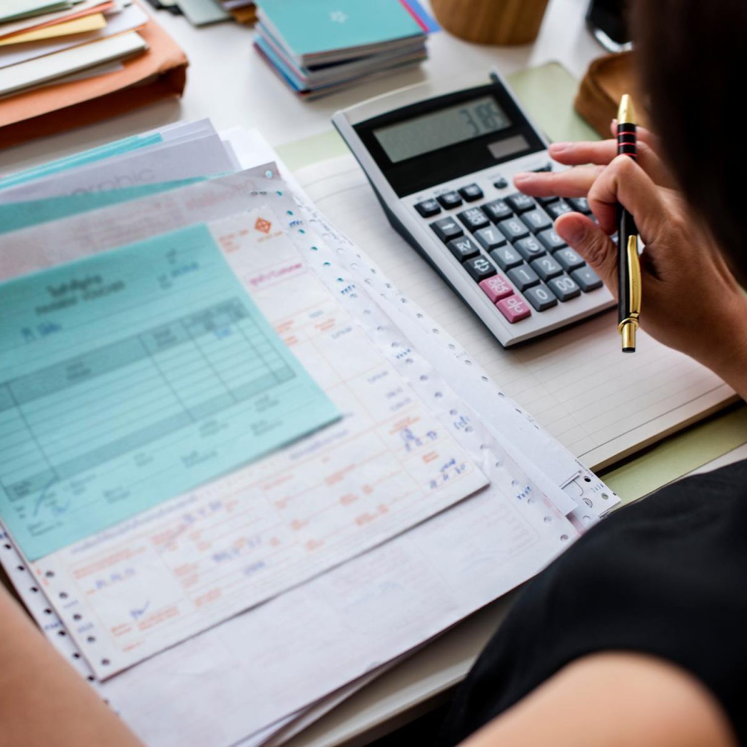 asian-woman-working-through-paperwork-1