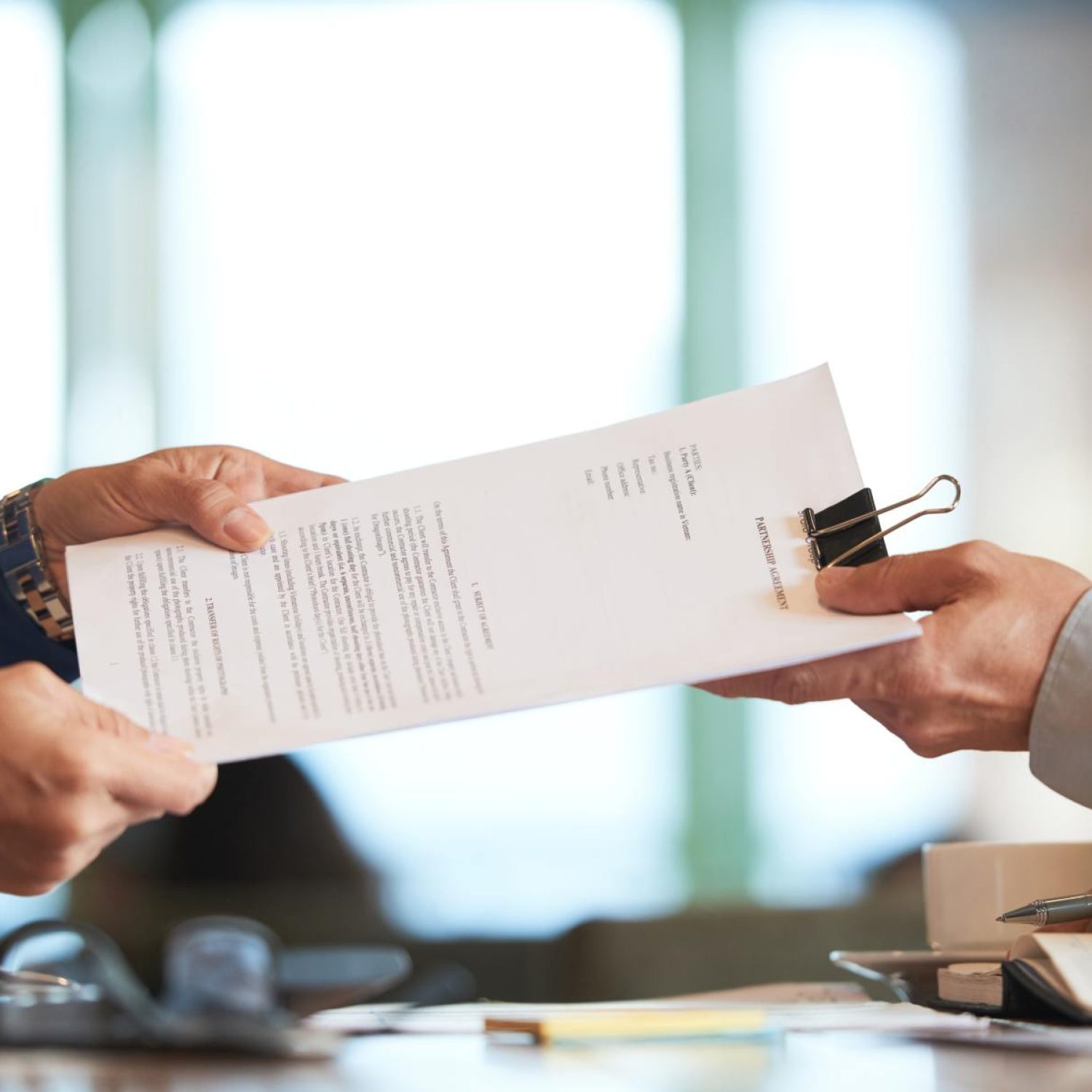 closeup-hands-passing-contract-unrecognizable-businessman (2)