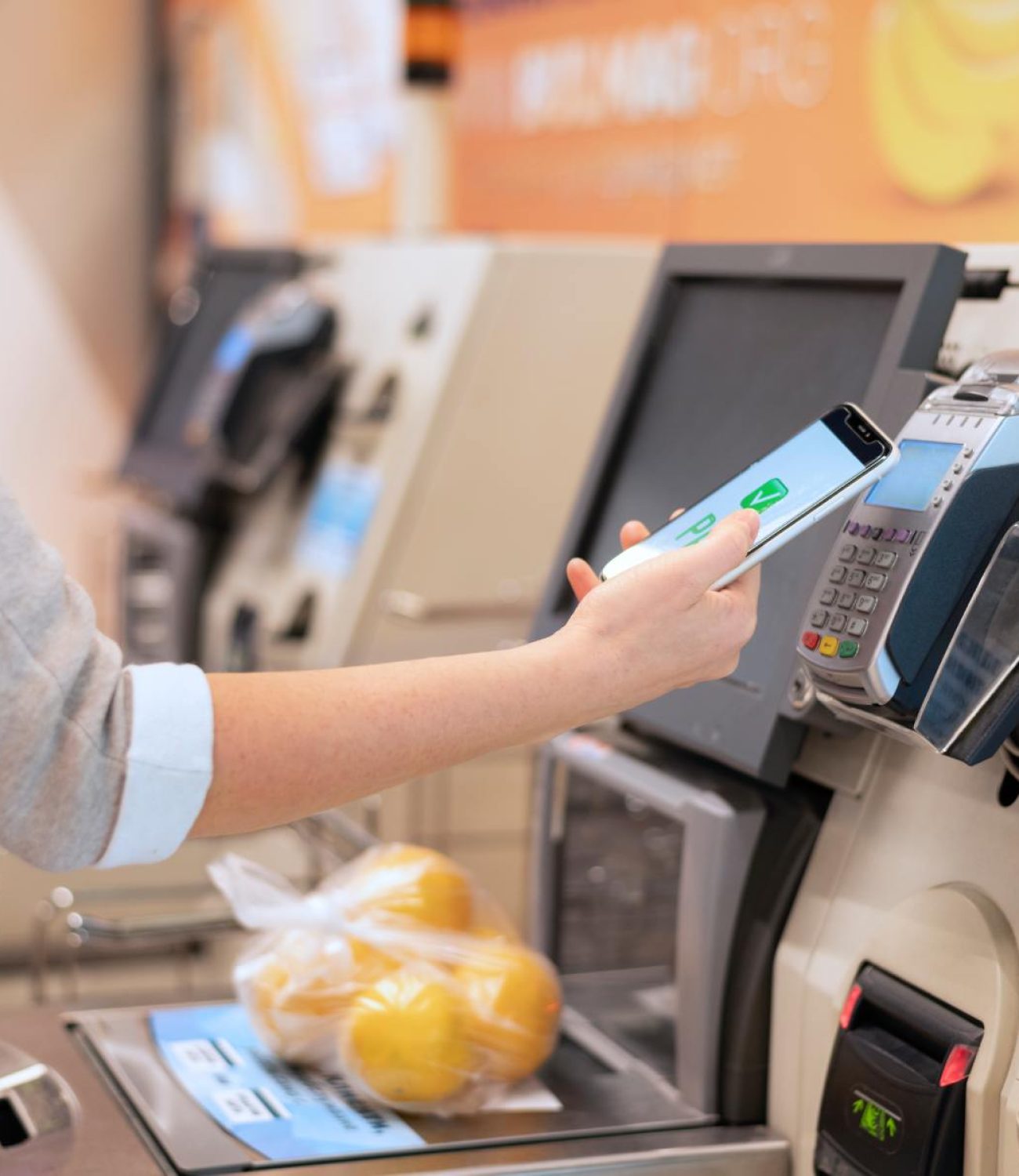 person-paying-with-its-smartphone-wallet-app (1)